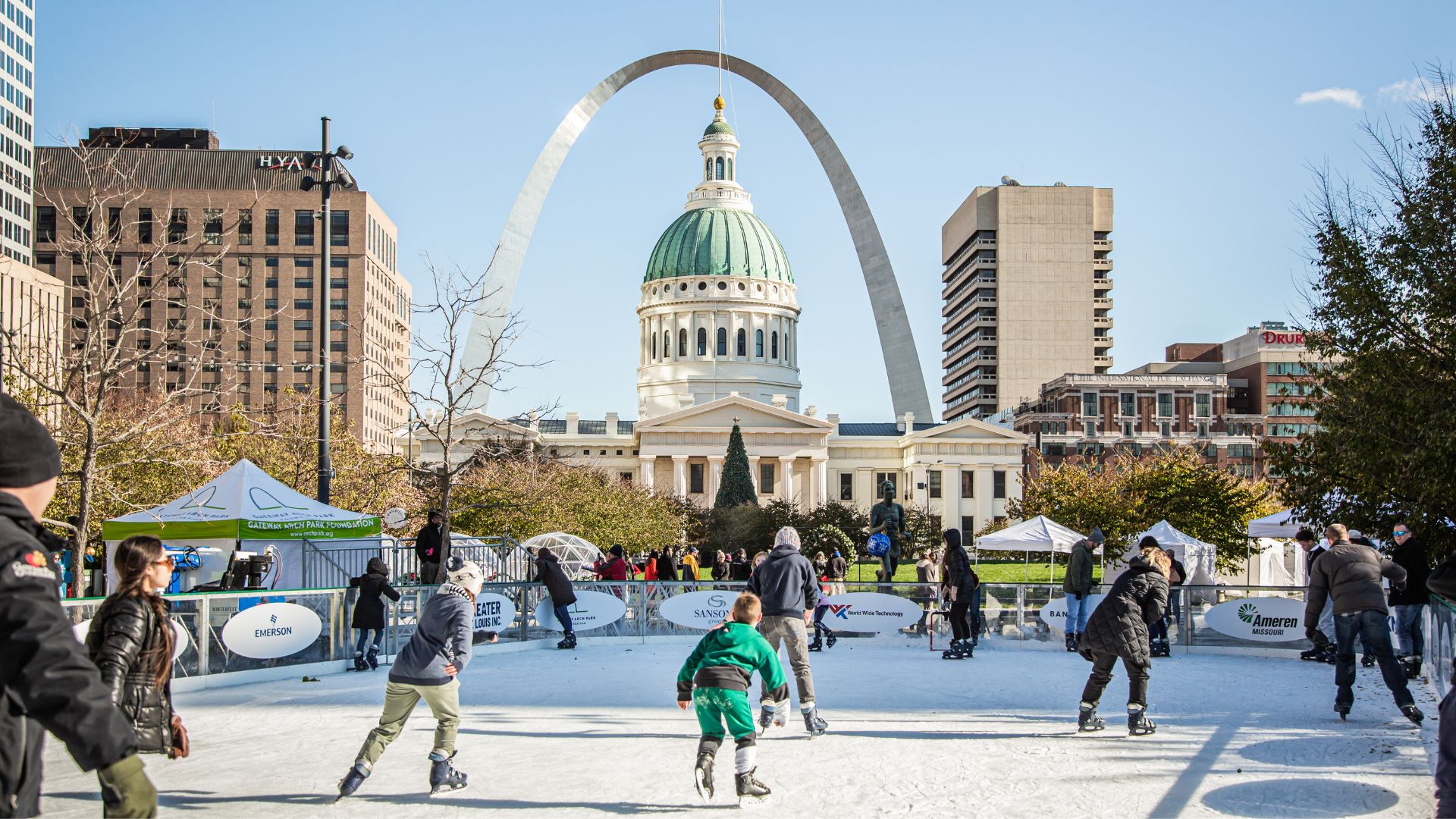 People of all ages ice skate at Winterfest in downtown St. Louis.