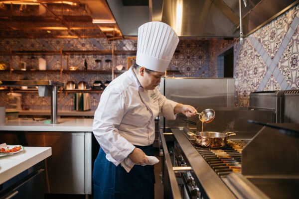 An esteemed chef mans the stove at Casa Don Alfonso located in The Ritz-Carlton, St. Louis.