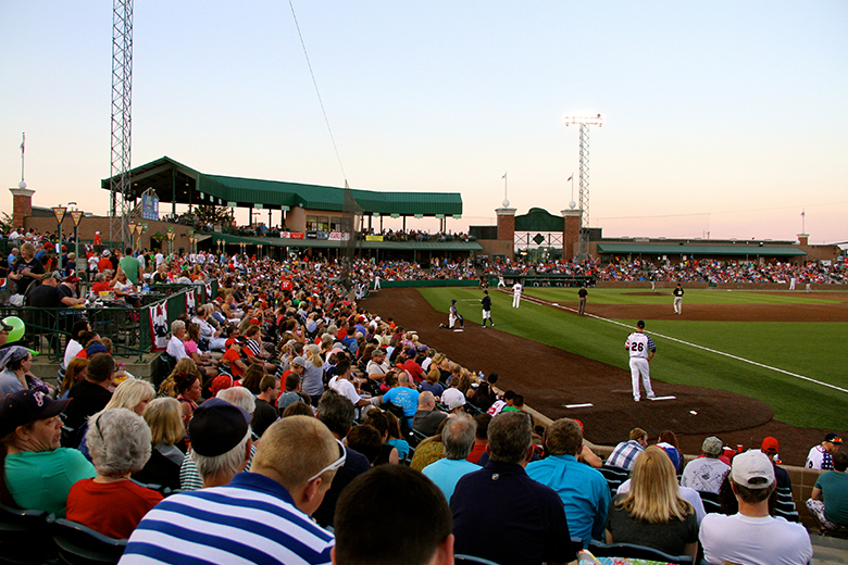 Sports fans watch the Gateway Grizzlies play at GCS Credit Union Ballpark in Sauget, Illinois.