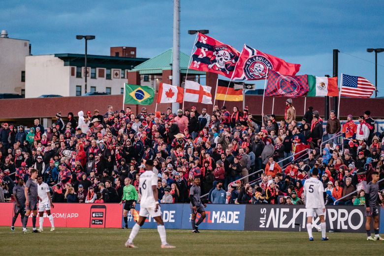 Fans cheer at CITYPARK stadium during a St. Louis CITY SC home game.