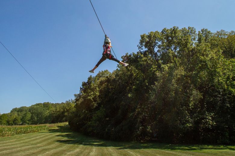 A kid zip lines at Adventure Valley in St. Louis.