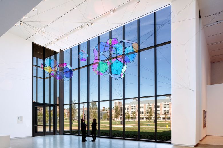 Argentine artist Tomás Saraceno's Cosmic Filaments hangs in the lobby of the Mildred Lane Kemper Art Museum.