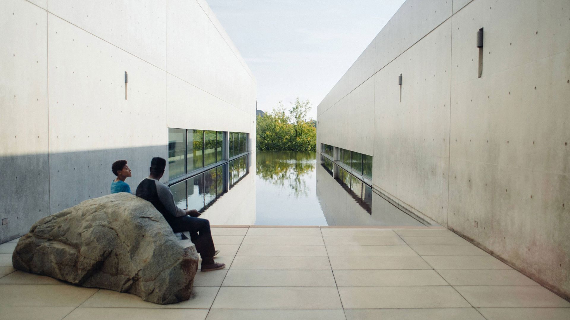 A couple sits on the Rock Settee sculpture at the Pulitzer Arts Foundation.