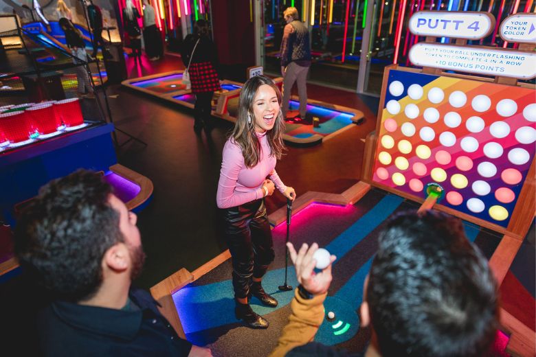 Puttshack at City Foundry is a tech-infused mini golf course with colorful courses and good vibes.