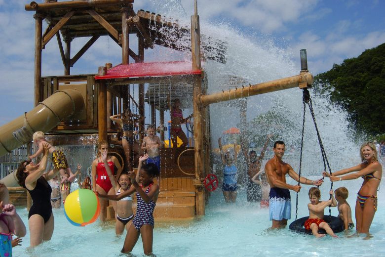 Kids splash around at the Itty Bitty Surf City at Raging Rivers WaterPark.