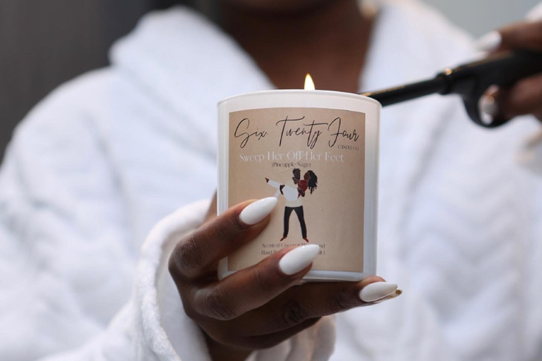 Six.TwentyFour Candle Co. is a Black-owned business based in St. Louis that sells candles such as Sweep Her Off Her Feet.