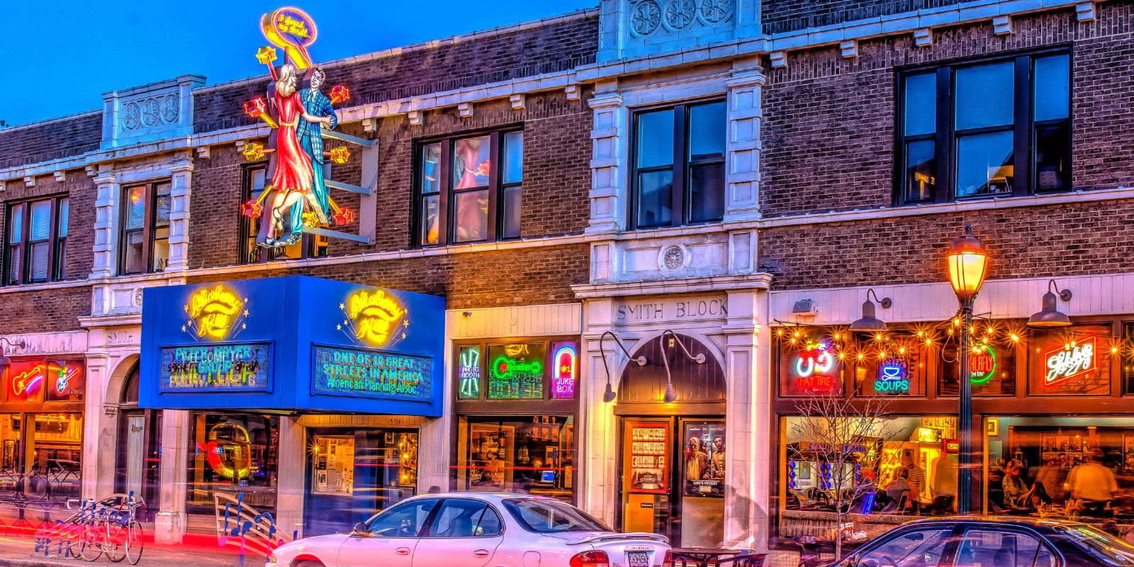 As the sun sets, neon signs light up the Delmar Loop and its businesses, including Blueberry Hill.