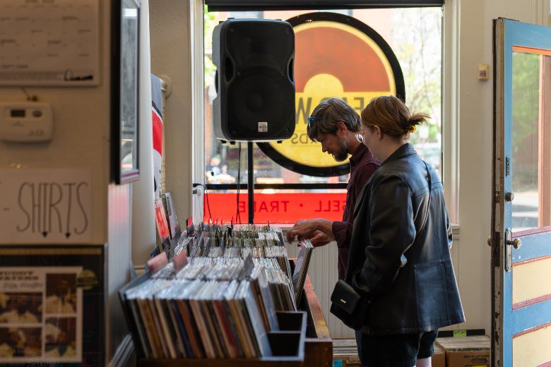 People peruse vinyl records at Dead Wax Records in St. Louis.