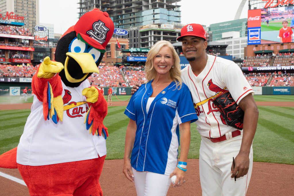 An American Optometric Association attendee ready to throw out the first pitch for a Cardinals Game at Busch Stadium.