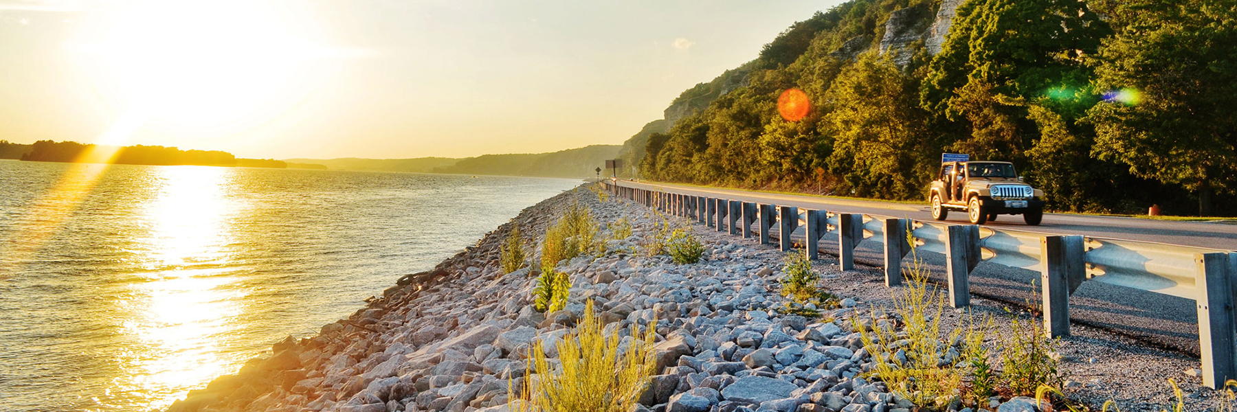 The Great River Road runs along the shore of the Mississippi River.