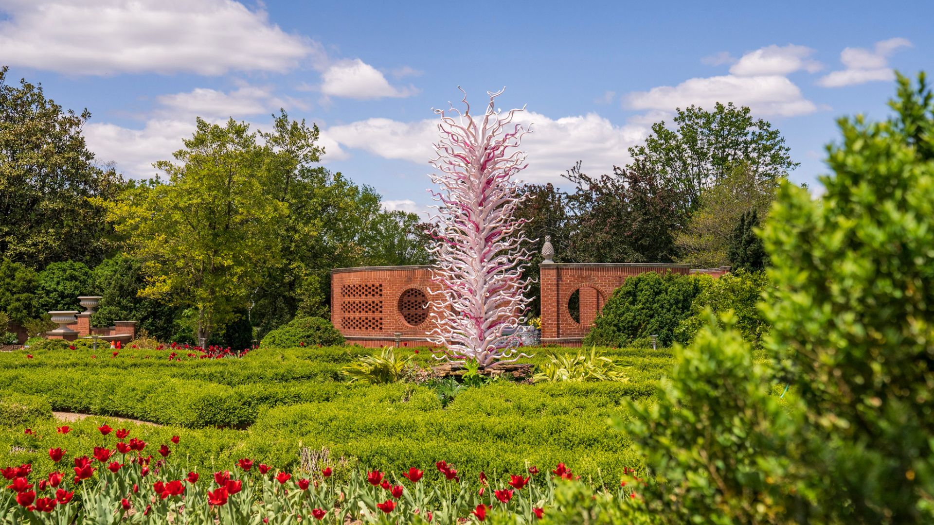 Dale Chihuly’s White Tower with Pink Trumpets is part of the exhibition Chihuly in the Garden 2023.