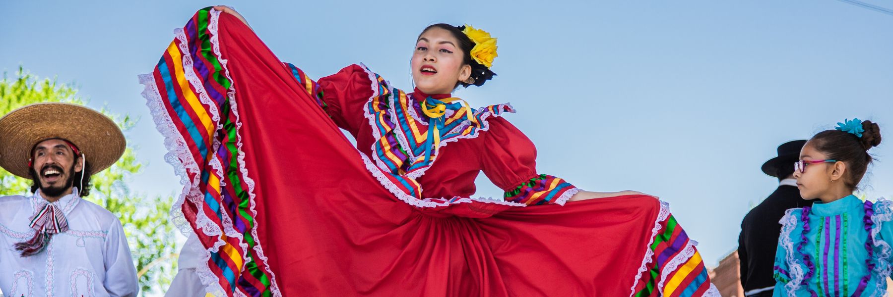 Hispanic dancers perform during Cinco de Mayo on Cherokee Street.