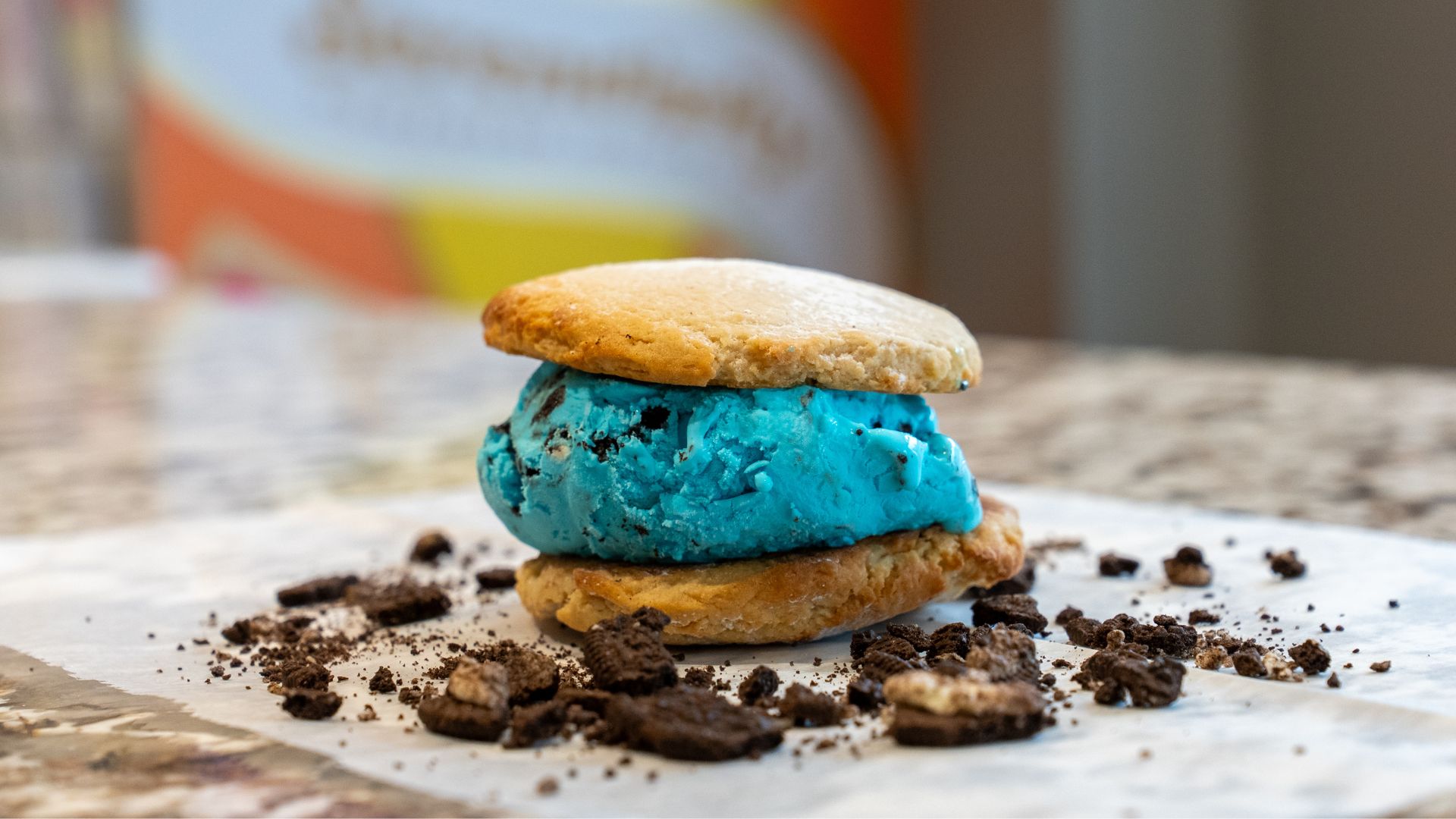 Ice cream is smashed between freshly baked cookies at Serendipity Homemade Ice Cream.