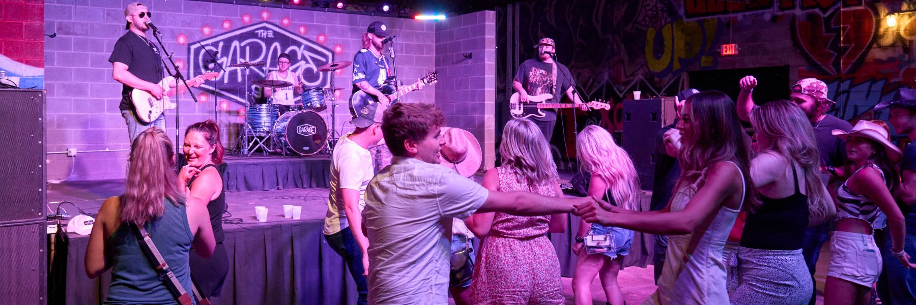Country music fans dance at The Garage in downtown St. Louis.
