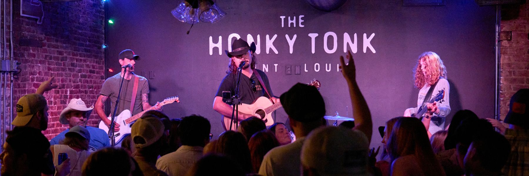 Country music plays at The Honky Tonk in downtown St. Louis.