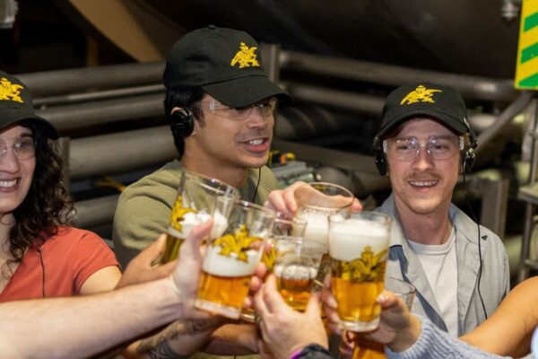 A group enjoys free beer on a tour of the Anheuser-Busch Brewery in St. Louis.
