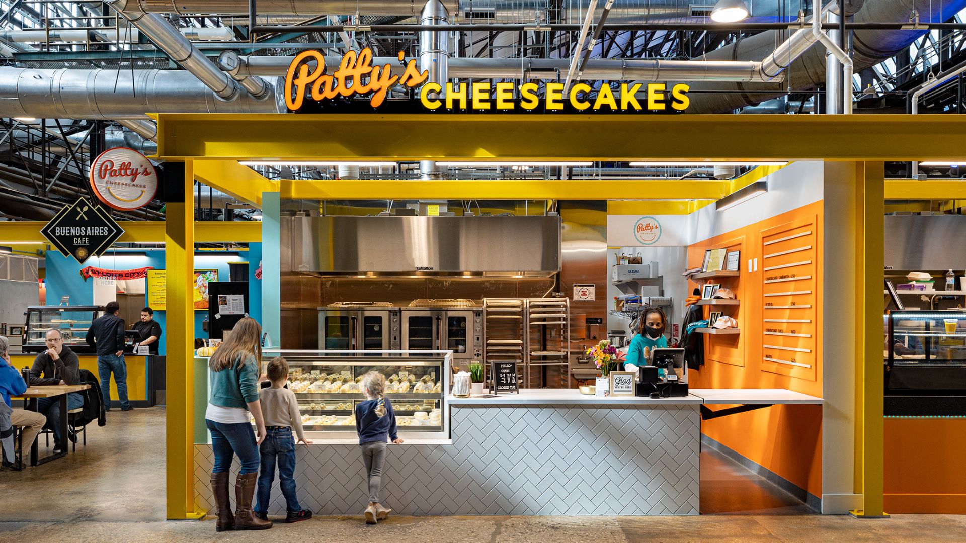 A family orders dessert from Patty's Cheesecakes at City Foundry STL.
