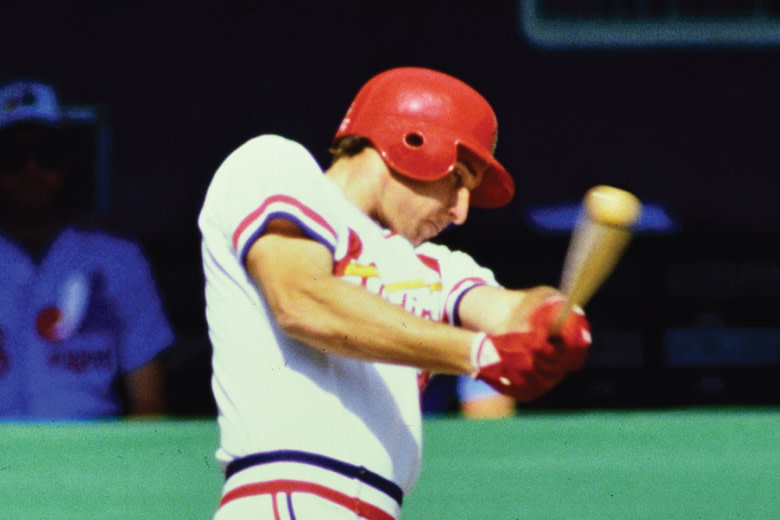 Former Cardinals Catcher Mike Laga takes a swing of the bat.