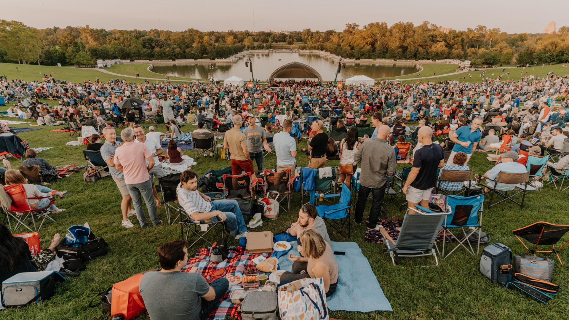 People gather on Art Hill in Forest Park to hear a free concert from the St. Louis Symphony Orchestra.