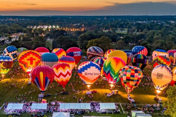 Hot air balloons glow in Forest Park during one of the top things to do in St. Louis this September.