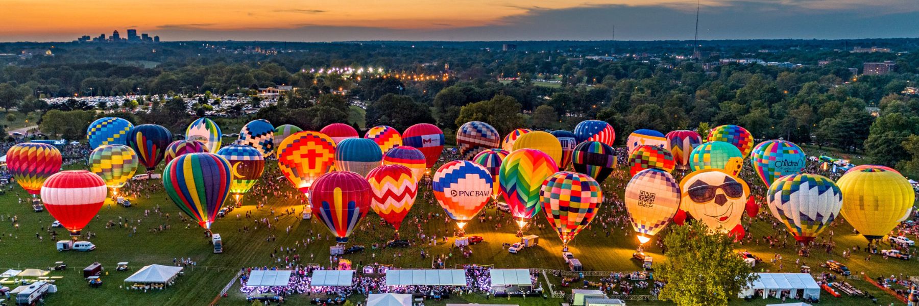Hot air balloons glow in Forest Park during one of the top things to do in St. Louis this September.