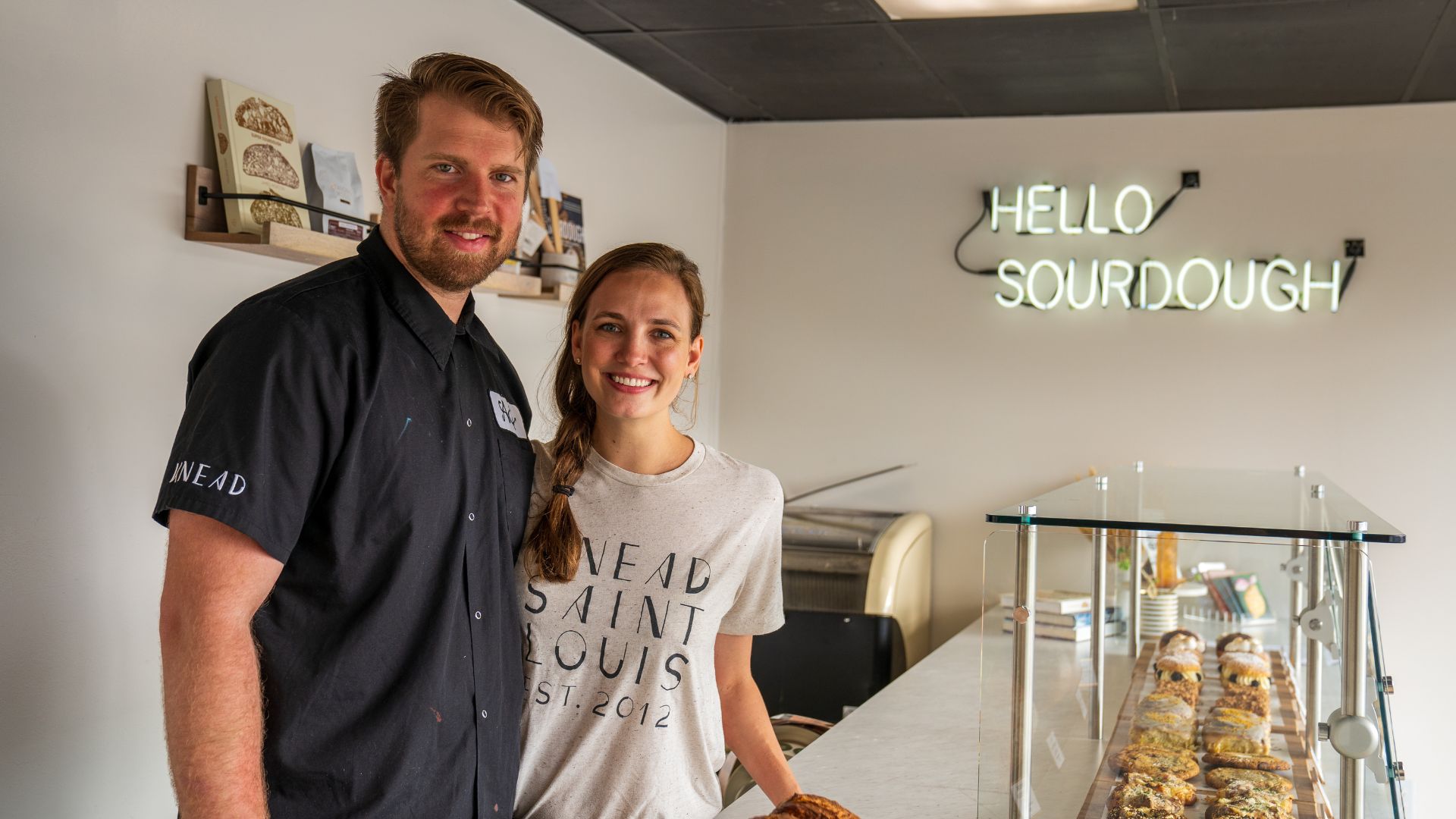AJ and Kirsten Brown, owners of Knead Bakehouse + Provisions, pose in the bakery.