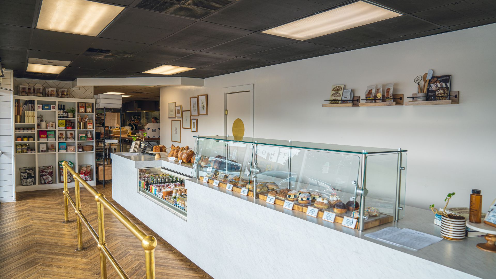 The interior of Knead Bakehouse + Provisions features a sourdough pastry case.