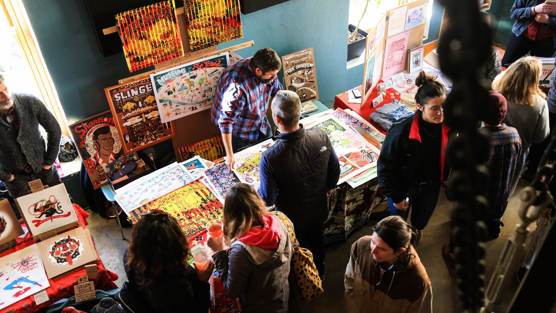 People shop for art at the Print Bazaar on Cherokee Street in St. Louis.