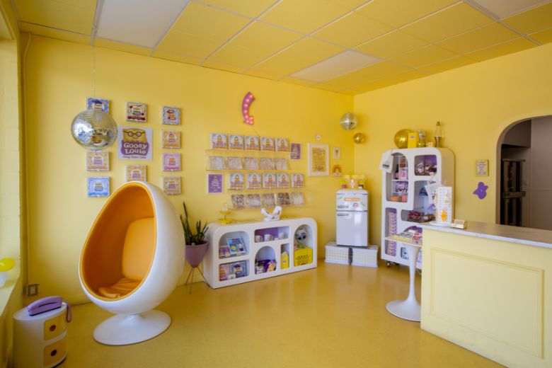 The interior of Gooey Louie is butter yellow.