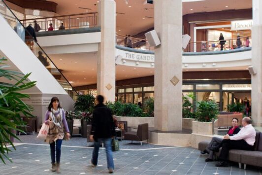 People mill about the Saint Louis Galleria.