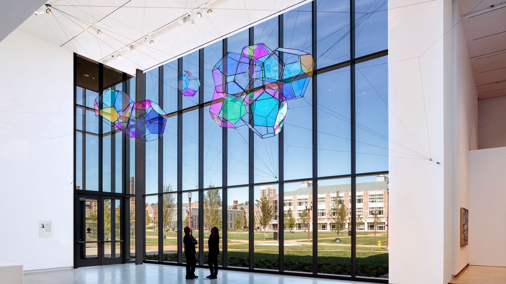 Argentine artist Tomás Saraceno's Cosmic Filaments hangs in the lobby of the Mildred Lane Kemper Art Museum.