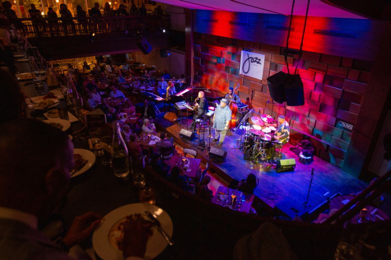 People enjoy dinner and a show at Jazz St. Louis.