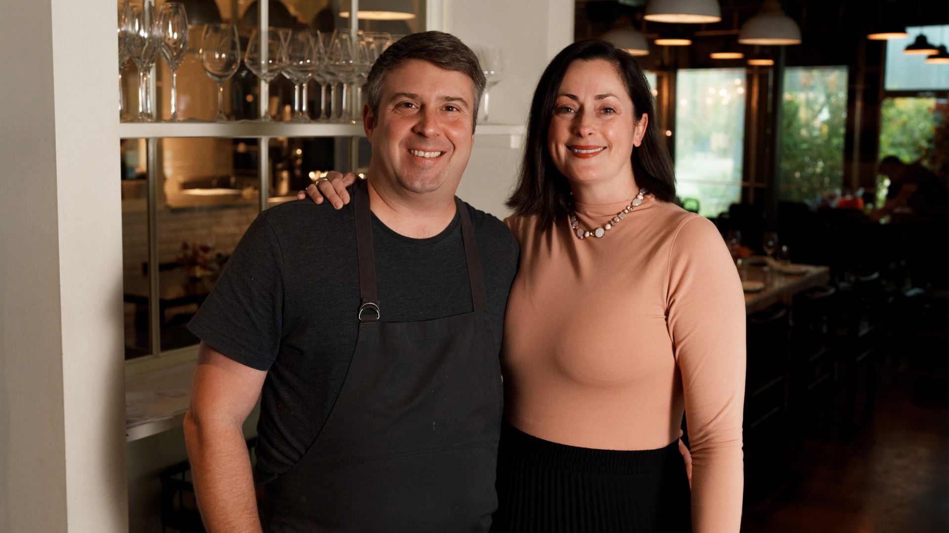 Michael and Tara Gallina pose at Vicia, which serves vegetable-forward cuisine in the Cortex Innovation District.