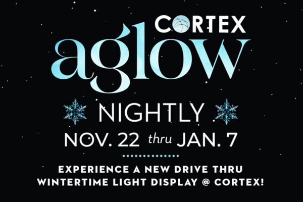 The Cortex Aglow winter-themed photo op features lighted snowflakes and illuminated trees.
