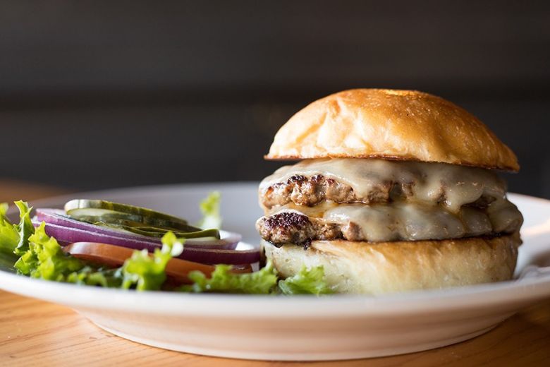 Frisco Barroom serves a variety of food, including burgers.
