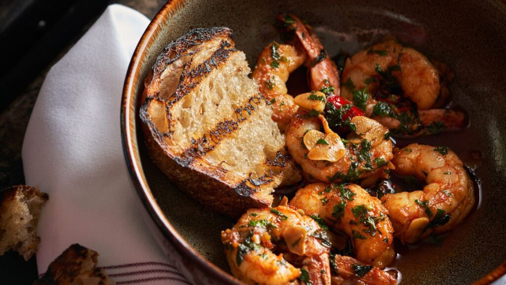 Idol Wolf at 21c Museum Hotel St. Louis serves Spanish-inspired dishes such as gambas al ajillo.