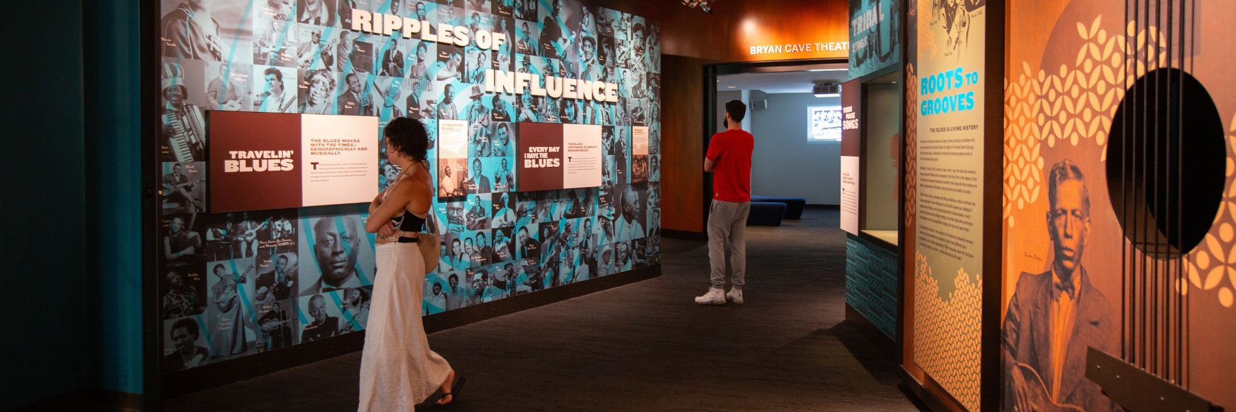 Visitors explore the artifact-driven exhibits at the National Blues Museum.