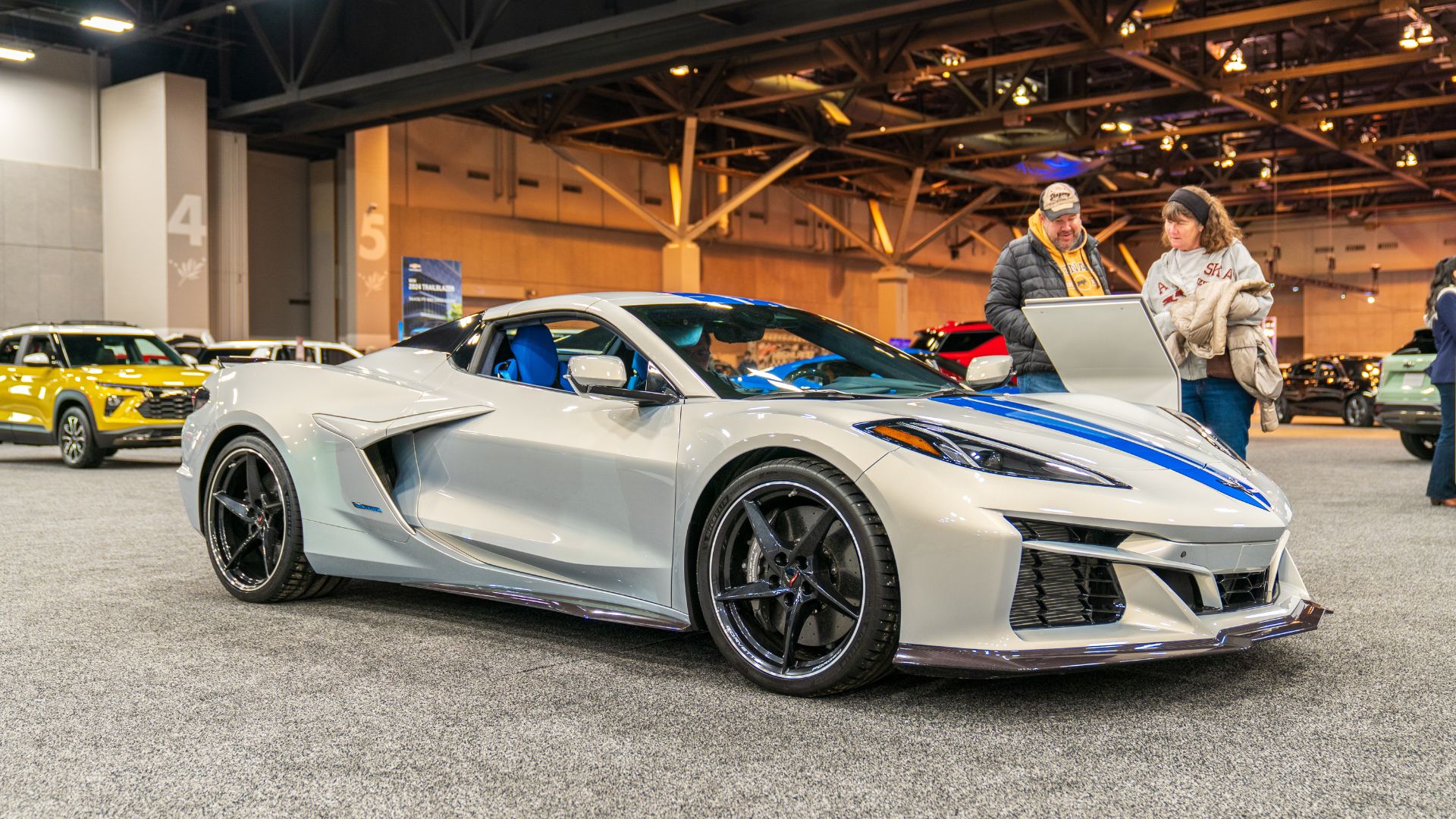 A couple looks at a high-performance vehicle at the St. Louis Auto Show, one of 15 things to do in St. Louis this January.