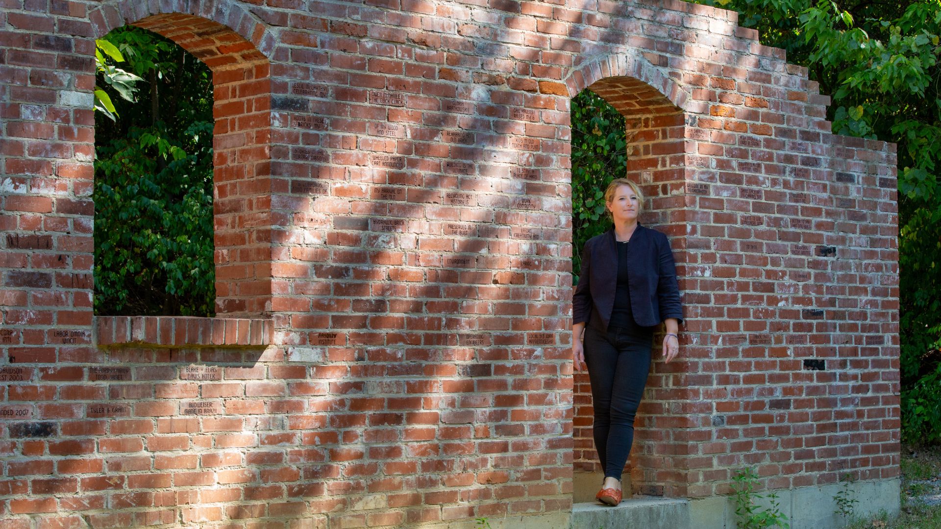 Curator Dana Turkovic poses at Laumeier Sculpture Park.