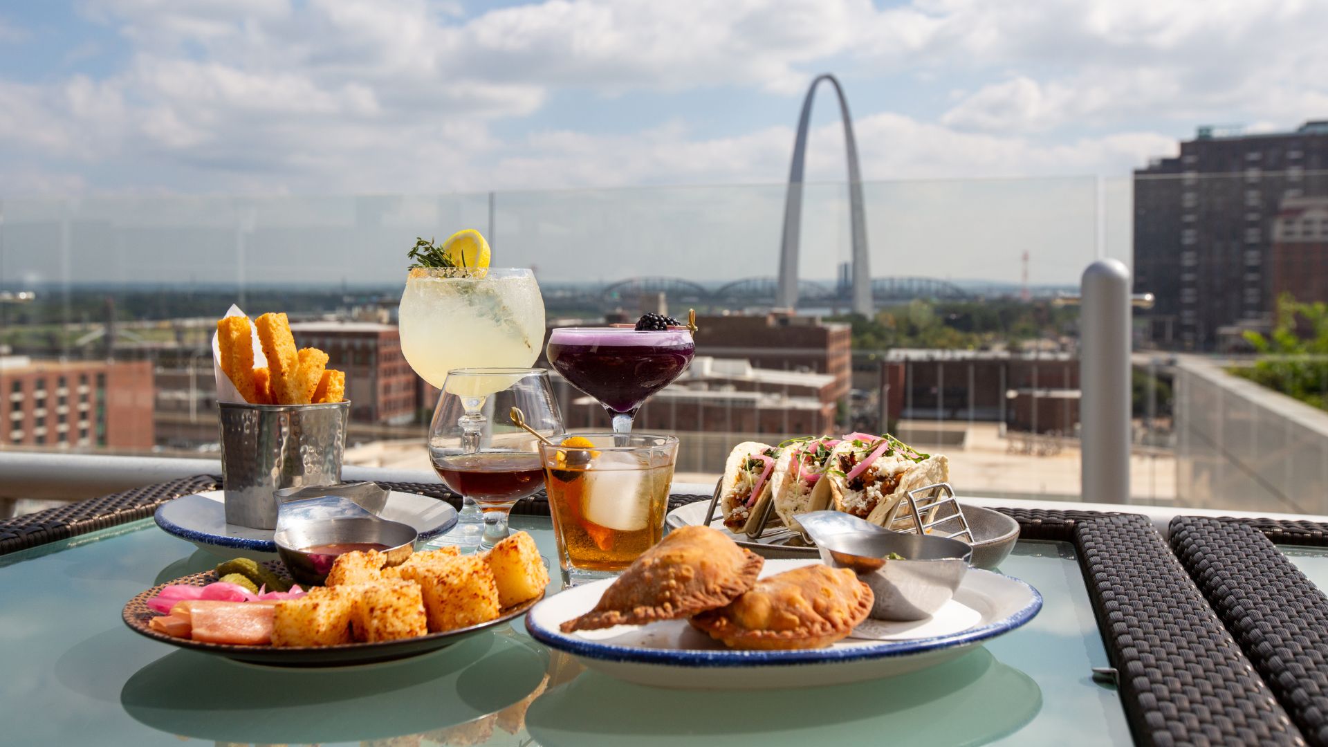 The rooftop bar at the Four Seasons Hotel St. Louis offers elevated food and drinks along with five-star views of the Gateway Arch.