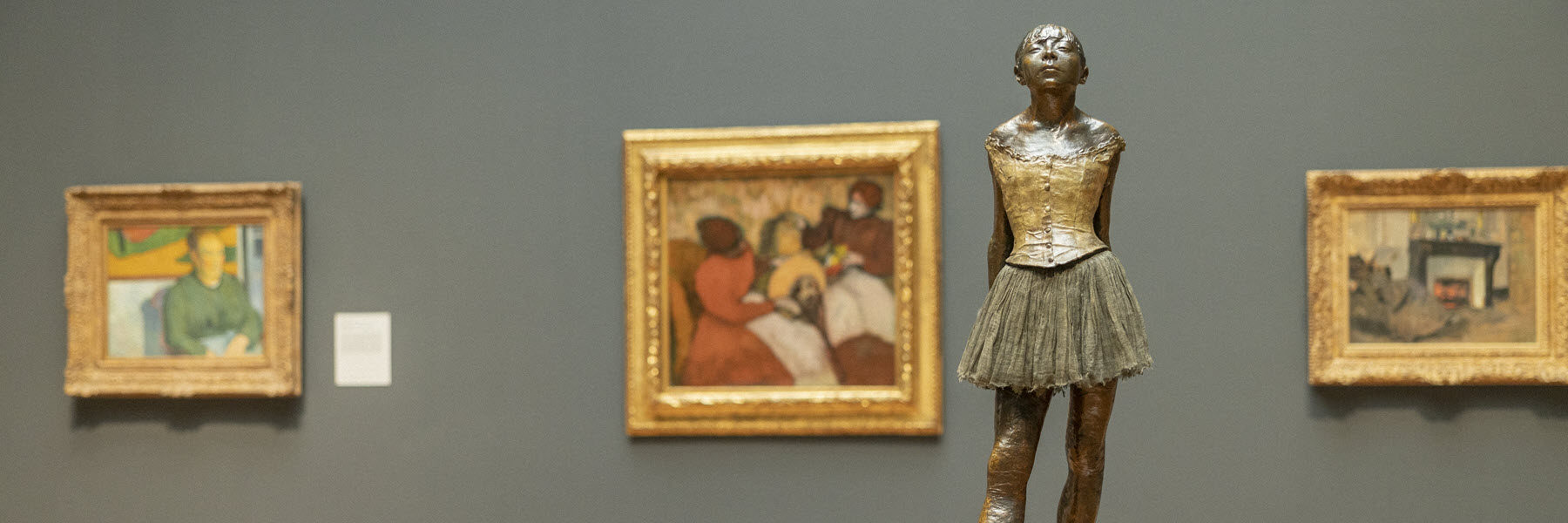 One of Degas dancers stands in a gallery at the Saint Louis Art Museum.
