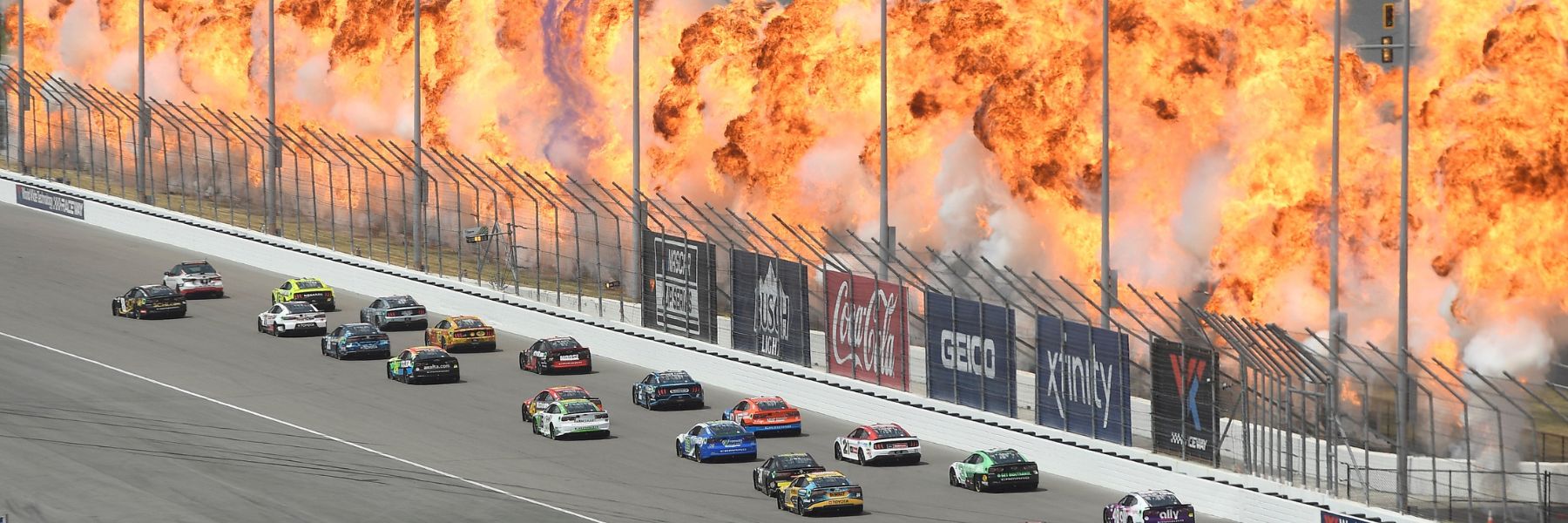 During the NASCAR Cup Series race in St. Louis, flames ignite around the track.