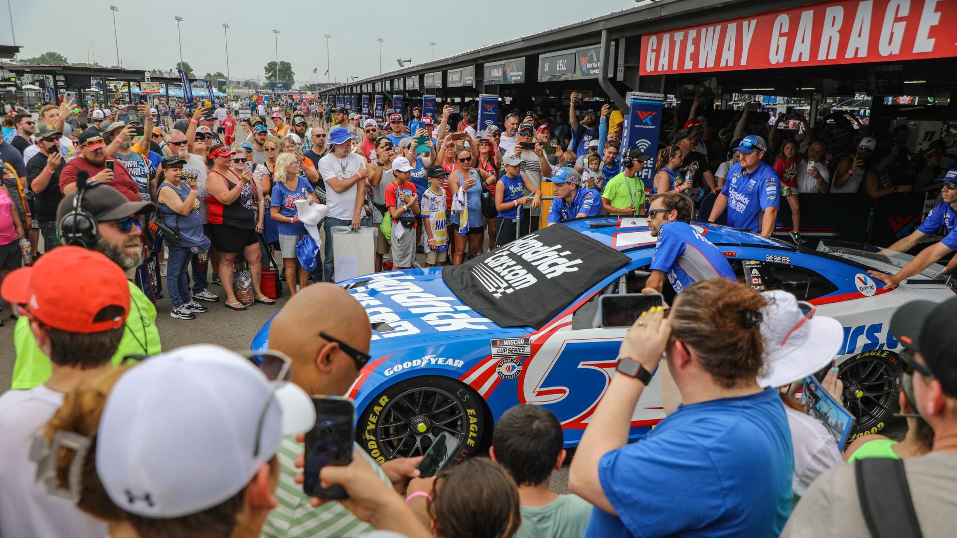 Racing enthusiasts meet a NASCAR driver at World Wide Technology Raceway.