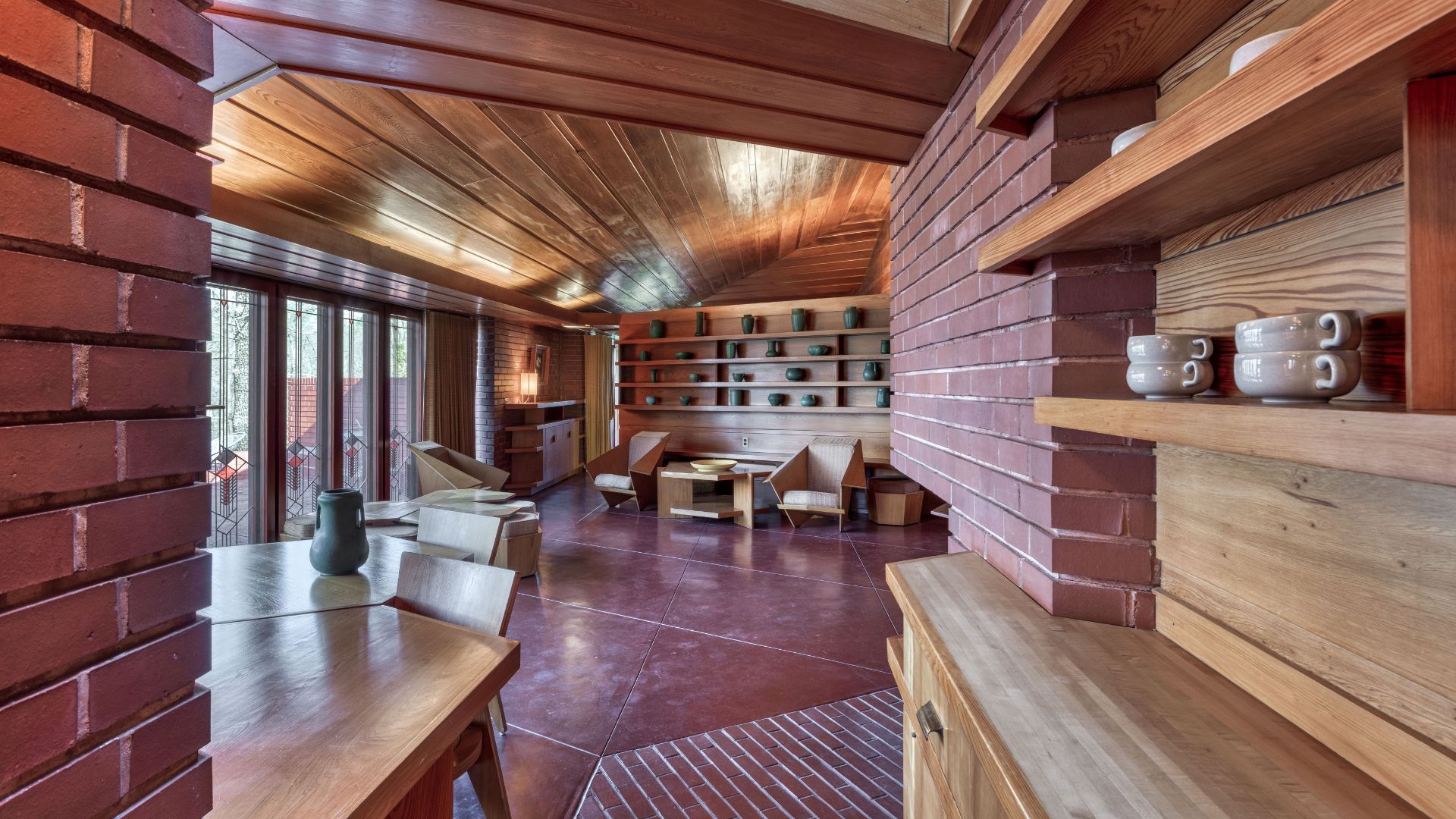 The Frank Lloyd Wright House in Ebsworth Park has an open living room and a central hearth.
