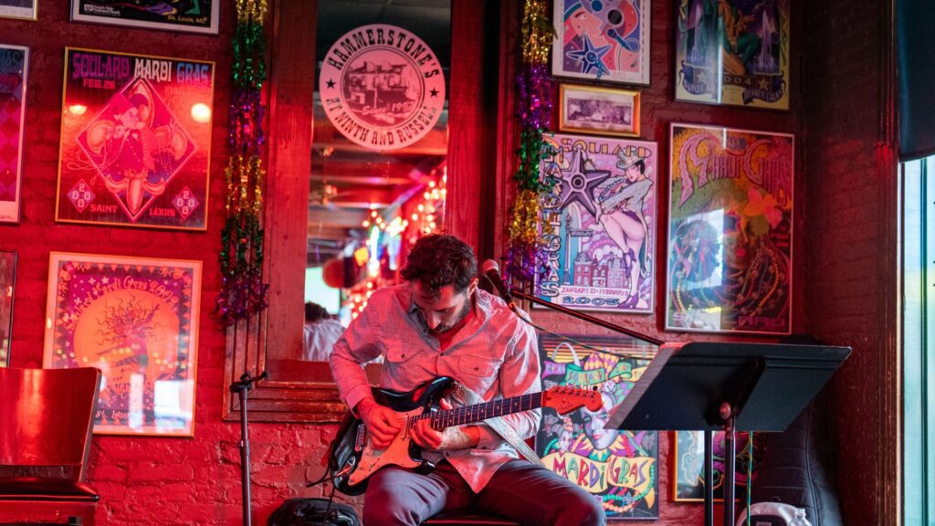 A guitarist plays live music at Hammerstone's in Soulard.