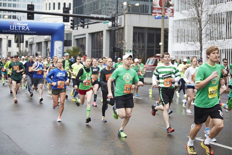 Athletes run through the streets of downtown St. Louis during the annual St. Patrick's Day Run.