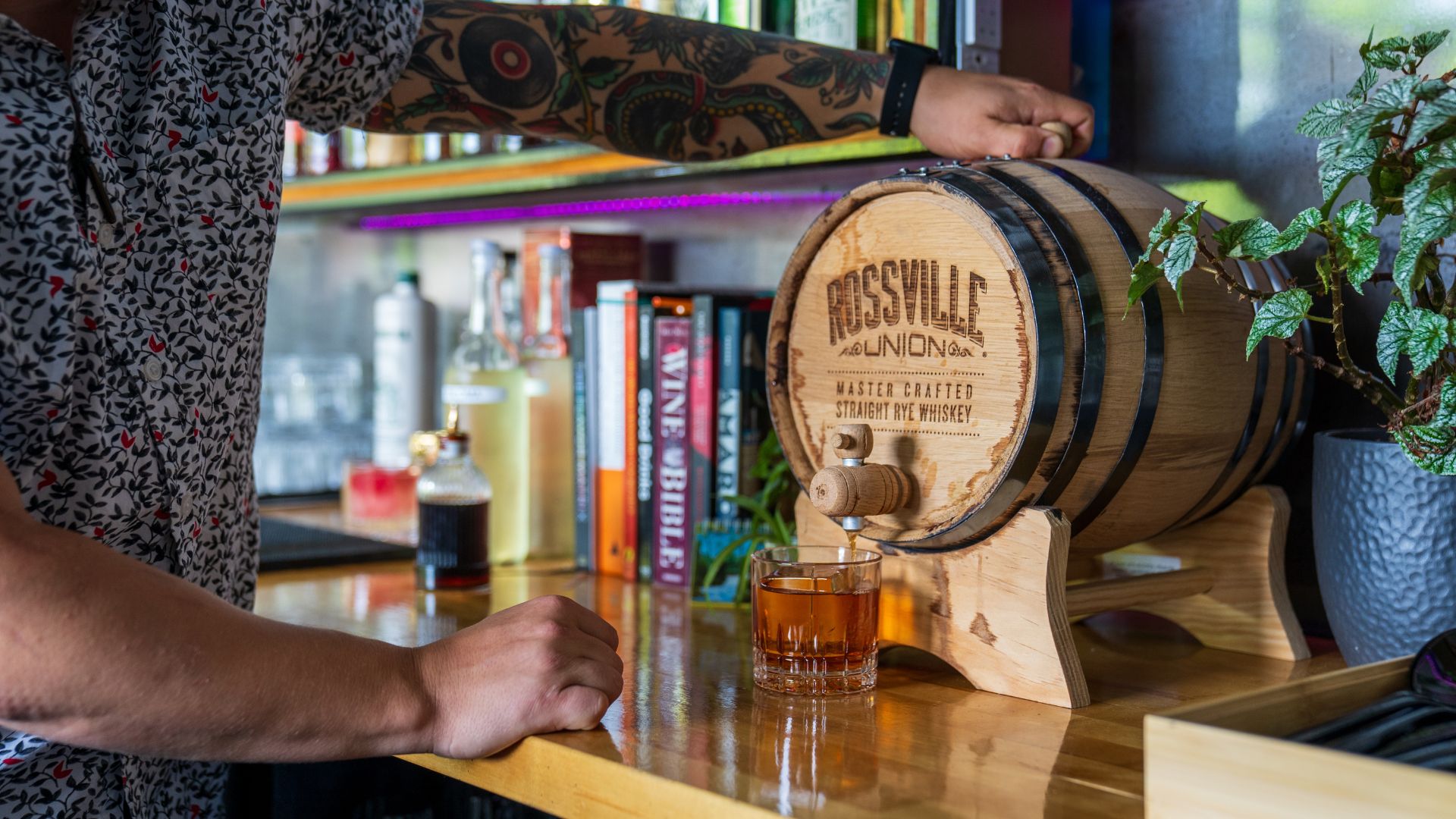The Lucky Accomplice serves straight rye whiskey from a miniature barrel.