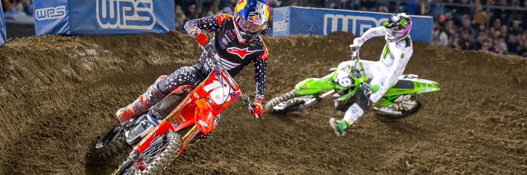 Bikers race around The Dome during AMA Supercross.
