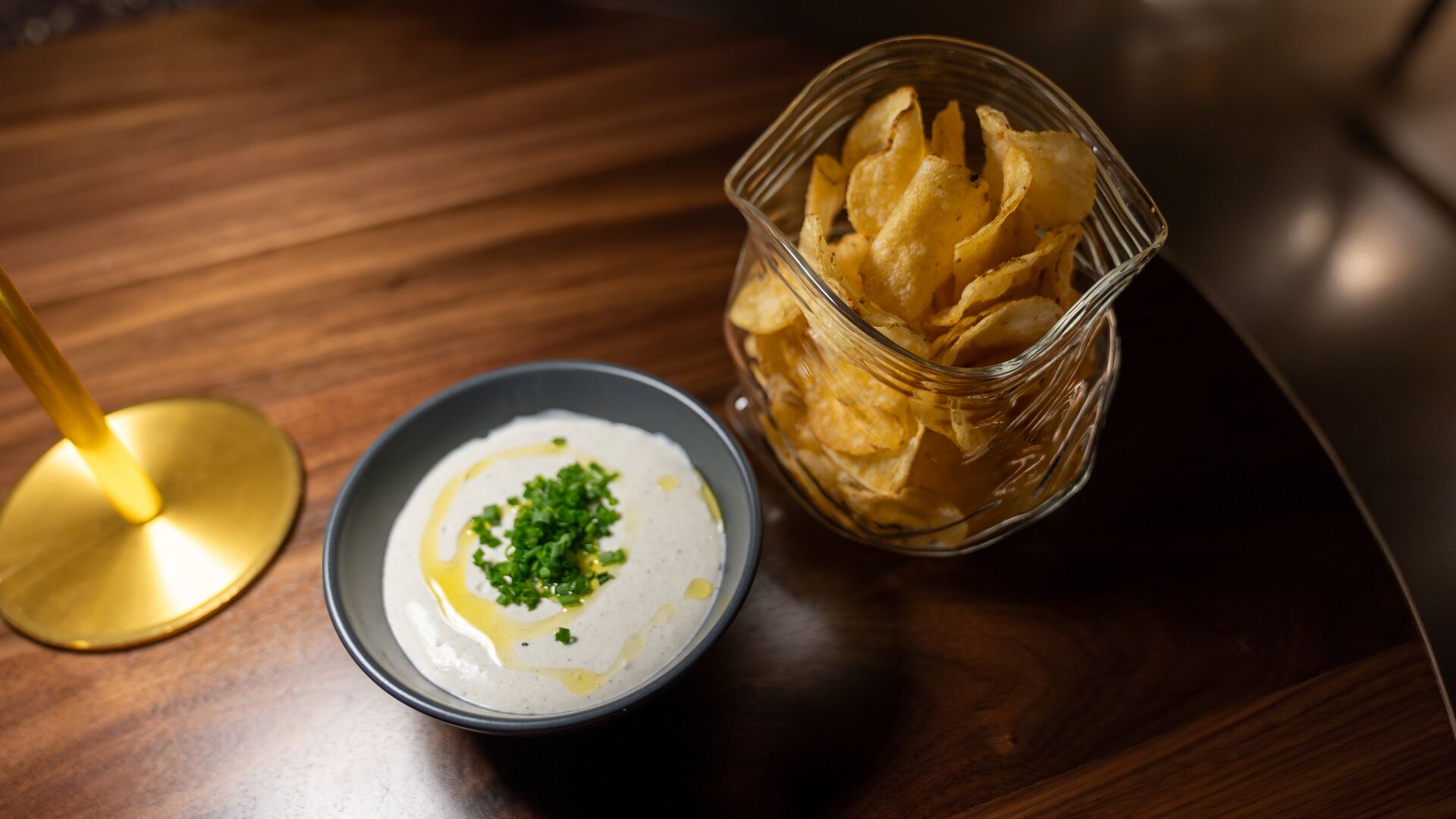 The charred scallion dip comes with kettle chips.