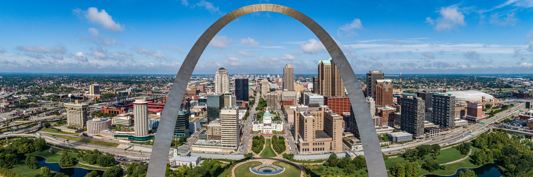 The Gateway Arch rises above the downtown St. Louis Skyline.